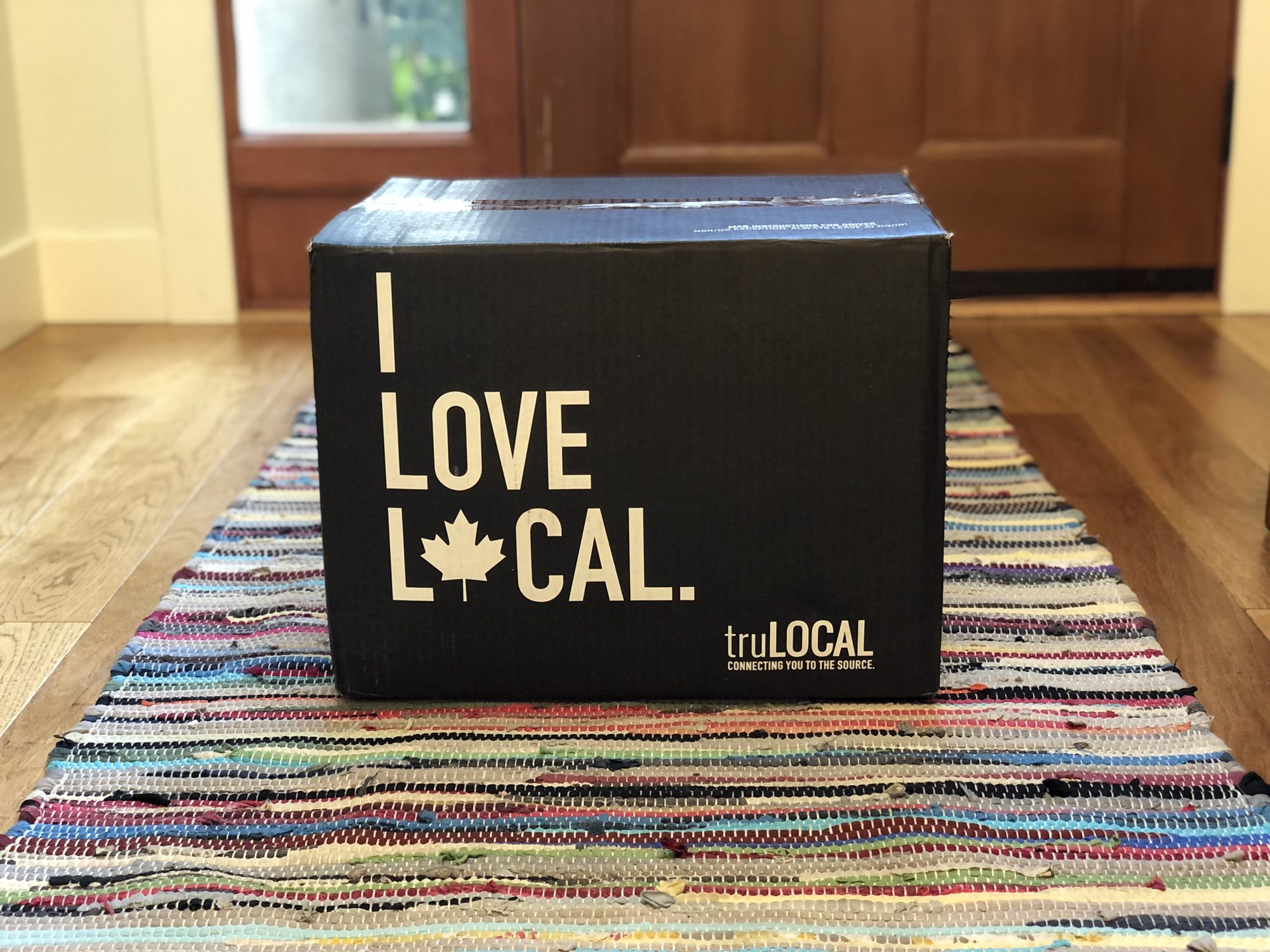 truLOCAL 'I Love Local' meat delivery box on the doorstep.